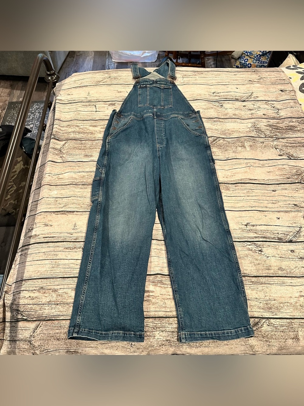 Wrangler Retro Classic Denim Overalls in an Uneven Dark Blue Wash Size Medium